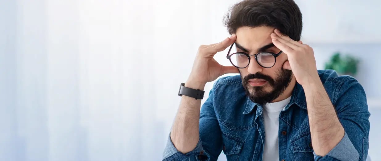 A man suffering from a headache