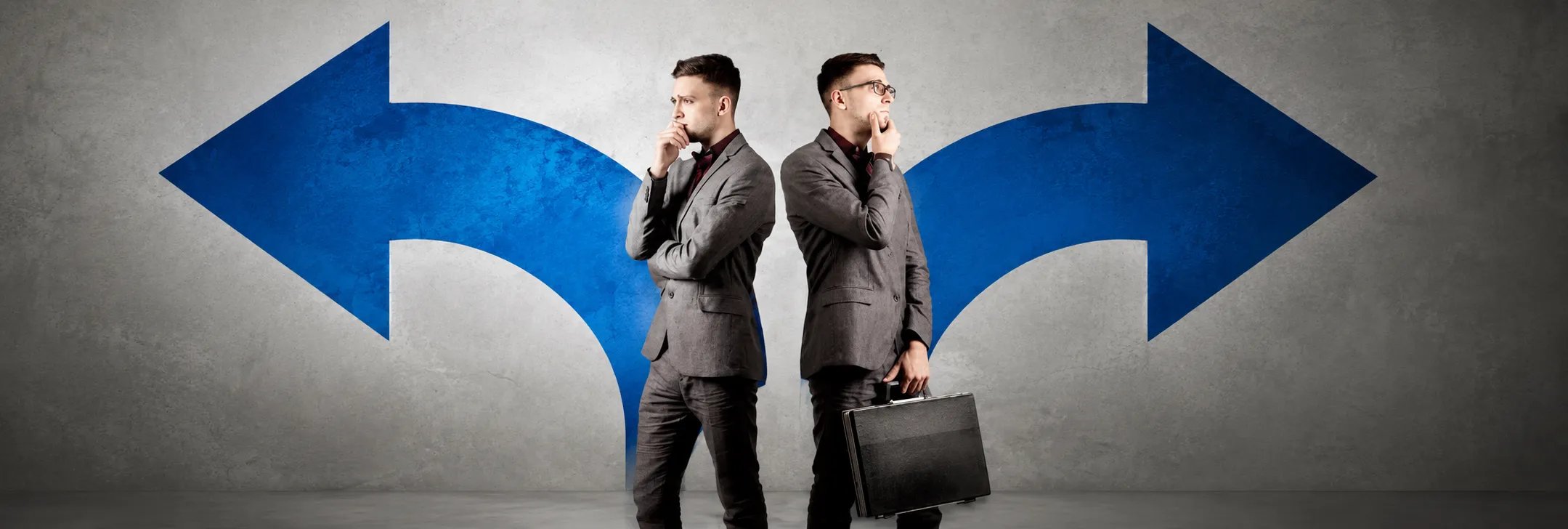 Two men standing back to back, thinking, with arrows pointing in opposite directions