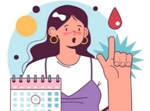  En kvinde med en kalender, der planlægger sin menstruation