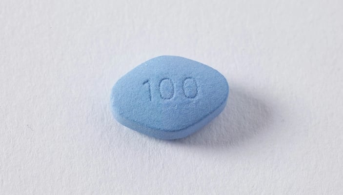 A blue tablet on a white background